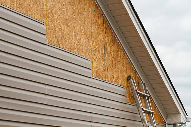 Professional Emergency Siding Repair technician working in Covington, GA